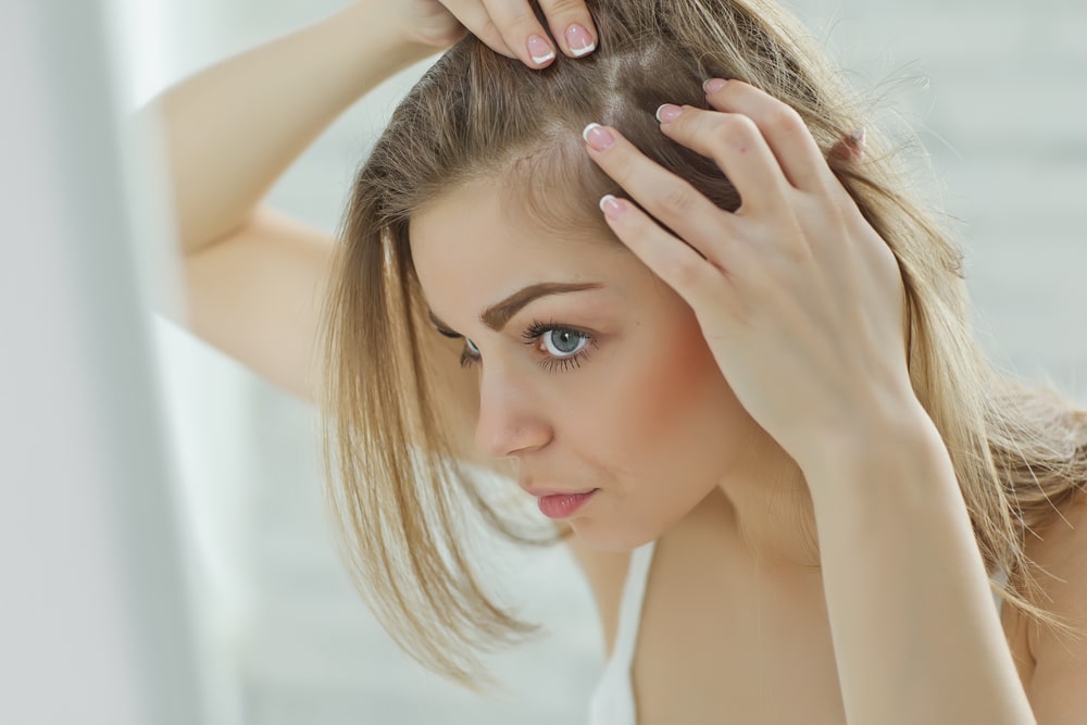 Nervous,Girl,Looking,In,The,Mirror,Her,Scalp