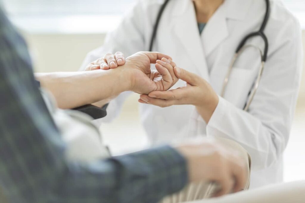 Female doctor and senior man